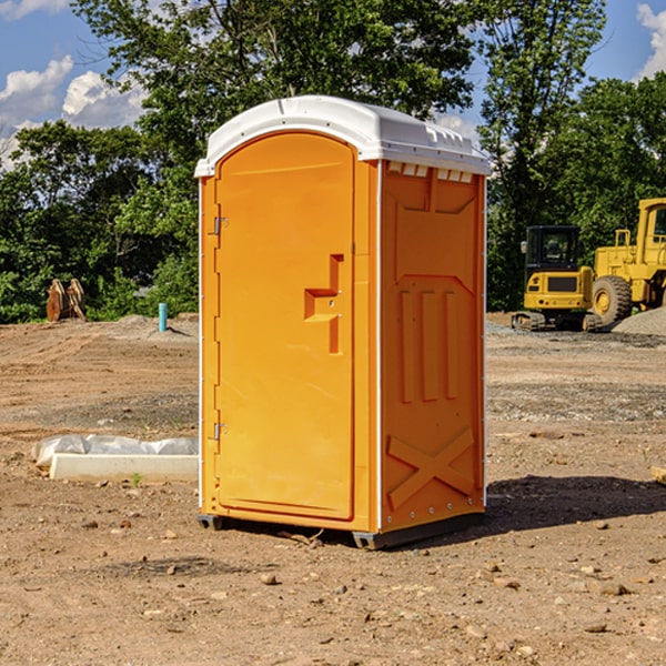 what is the cost difference between standard and deluxe portable restroom rentals in Hammon